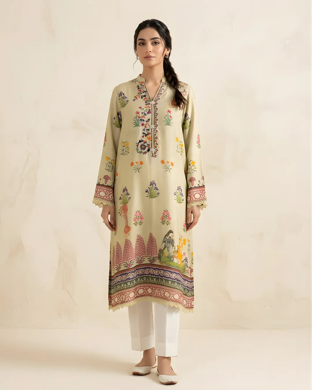 Woman wearing a beige floral embroidered kurta with white pants, festive formal attire
